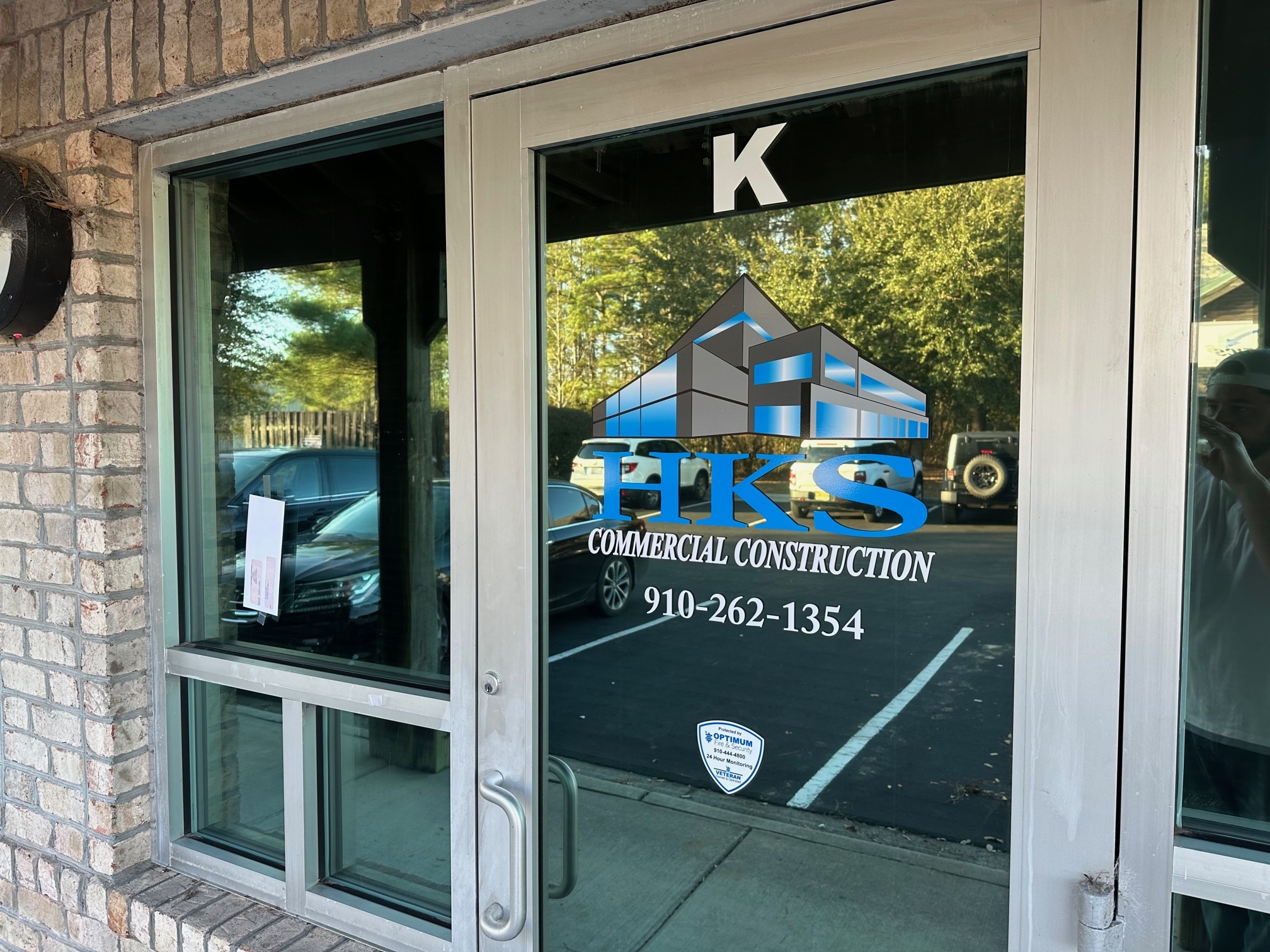 Storefront window graphics and lettering in Wilmington