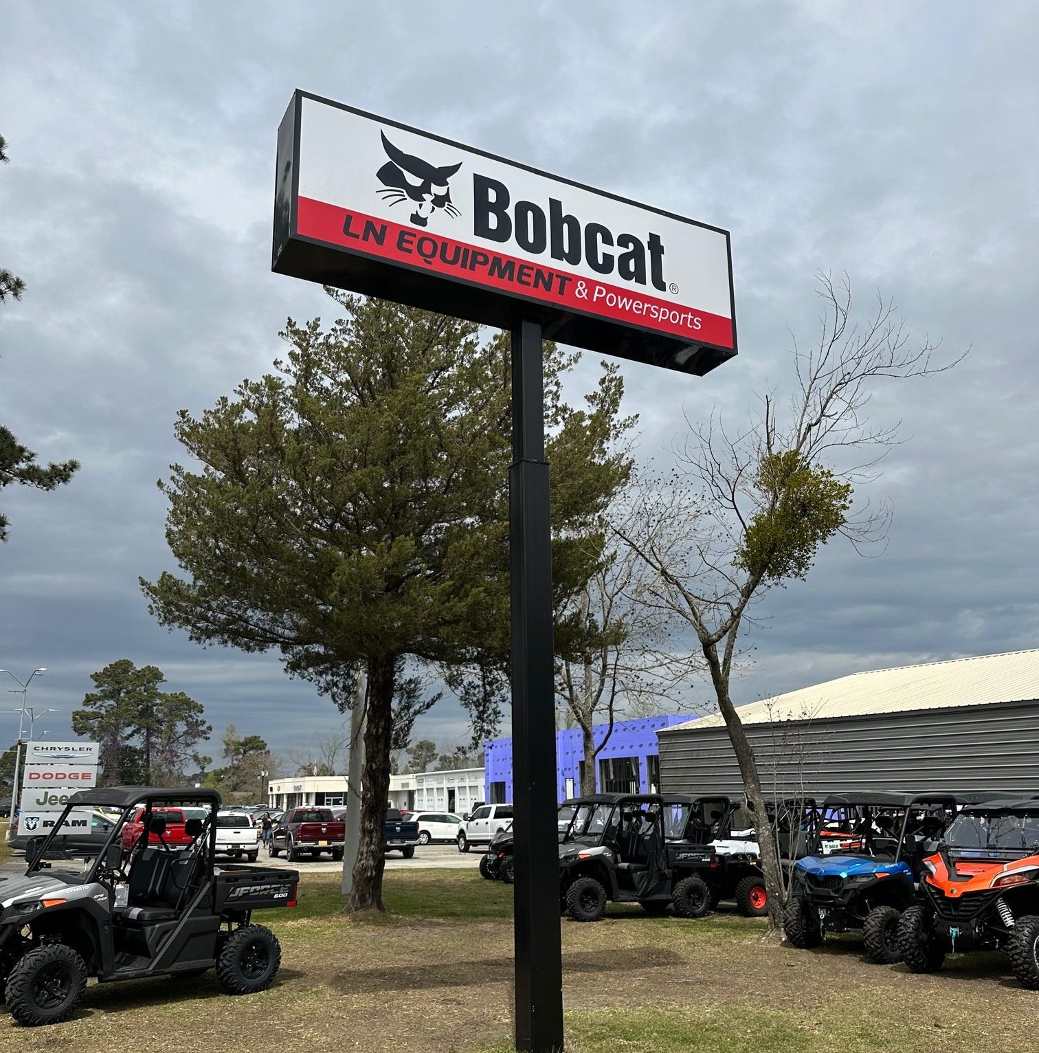 Pole sign of Bobcat installed by Saltwater Signworks in Wilmington, NC