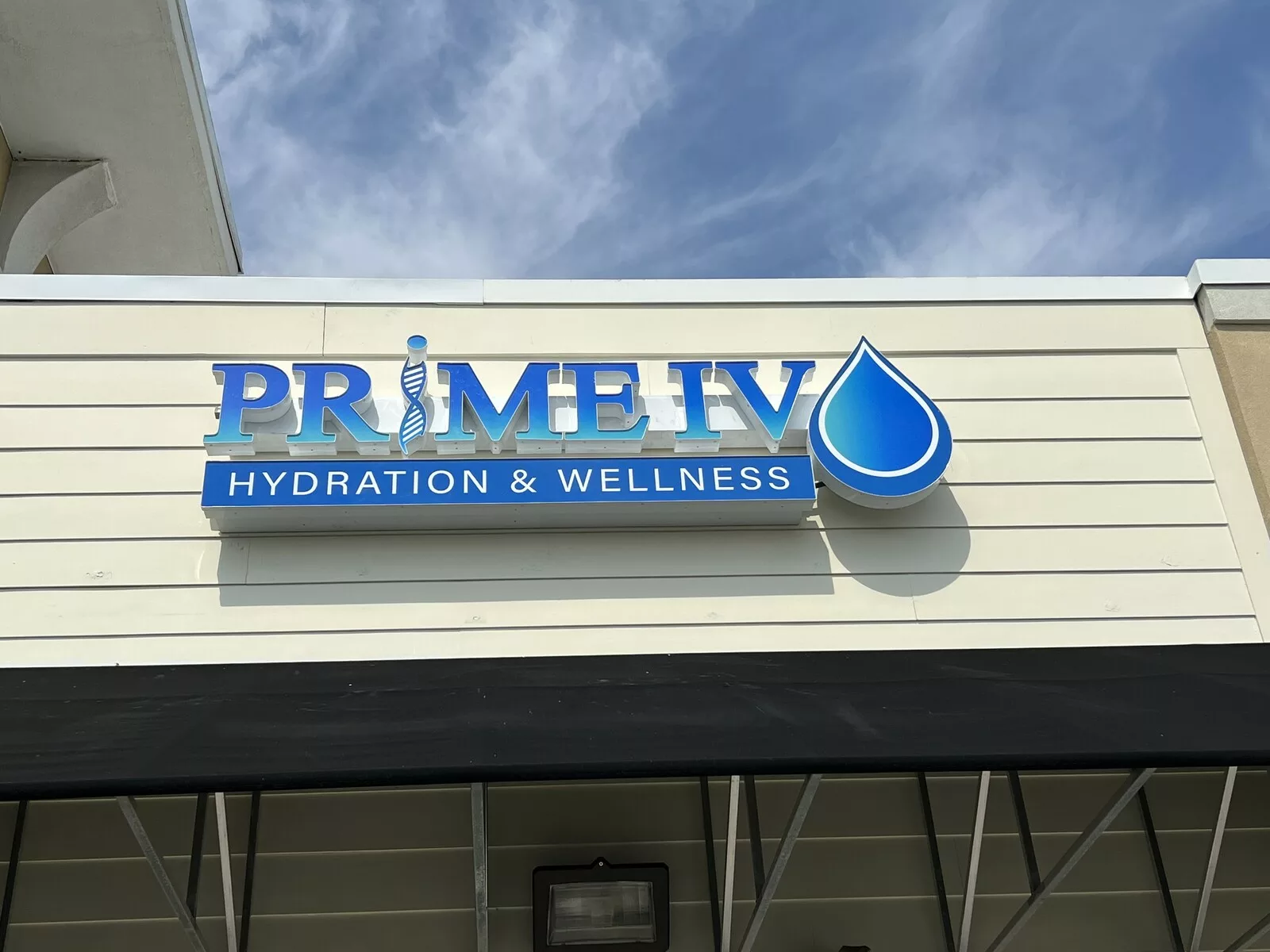 Prime Iv Business Sign
