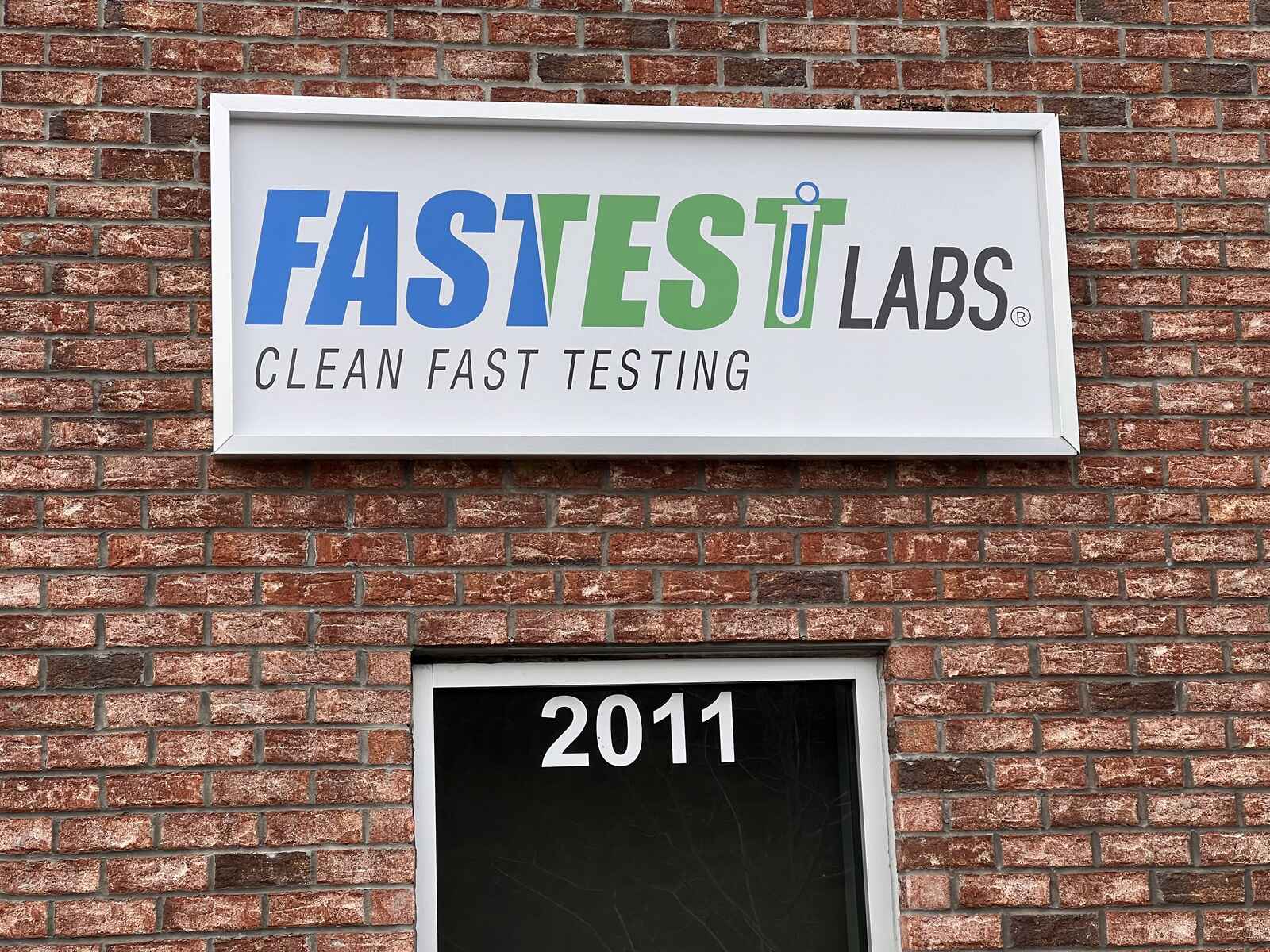 Storefront Sign Of Fastest Labs